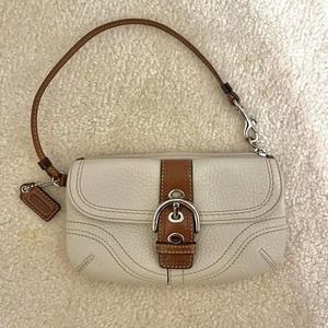 Coach soho buckle flap leather